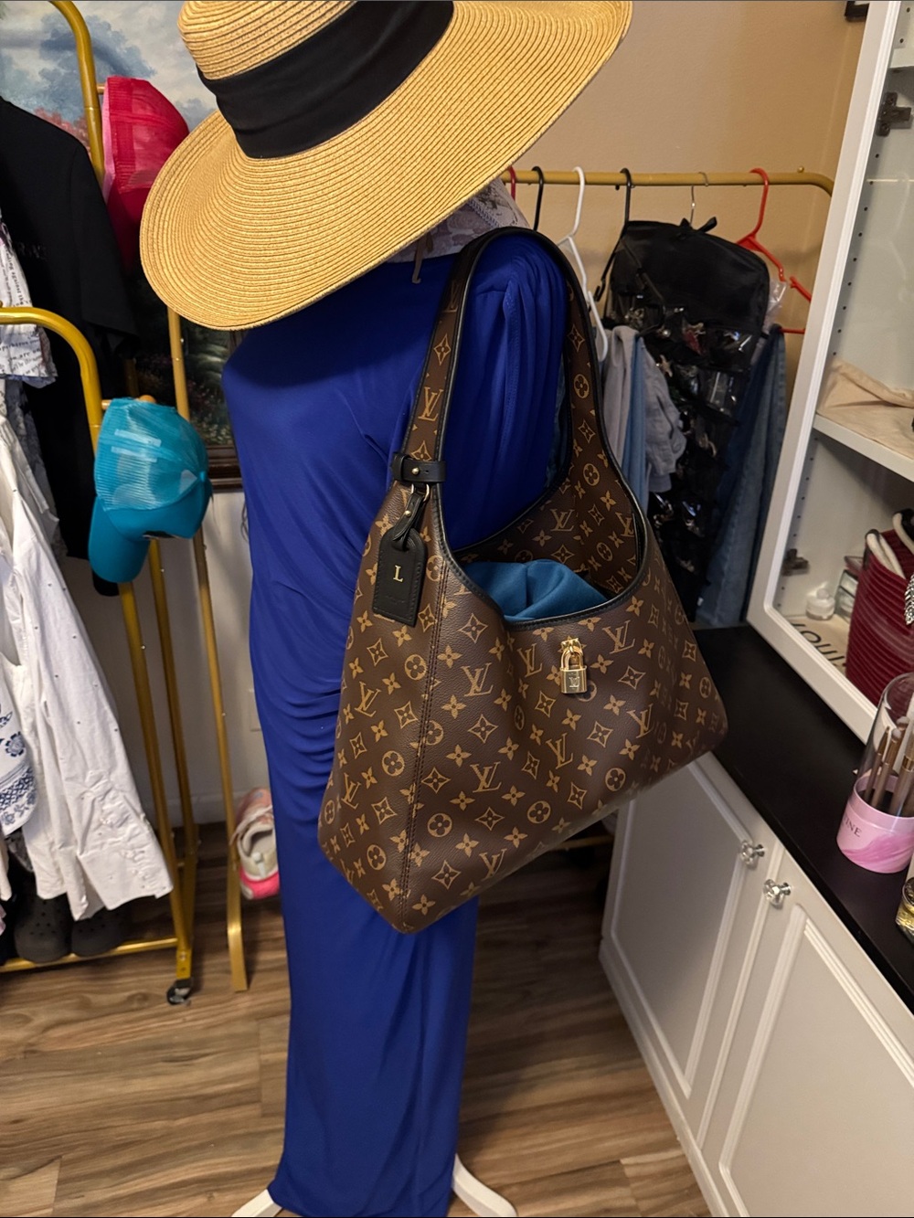 Louis Vuitton Brown Monogram Shoulder Bag with Black Interior.